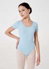 Young dancer wearing light blue cap sleeve leotard front view.