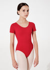 Young dancer modeling red cap sleeve leotard front view.