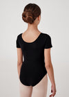 Back view of black cap sleeve leotard on young dancer.