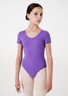Young dancer wearing purple cap sleeve leotard front view.