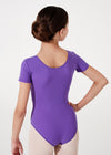 Young dancer wearing purple cap sleeve leotard back view.