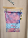 Pink mesh FTT logo shoe bag hanging on rack