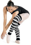 Black and gray striped dance leg warmers worn with dancewear