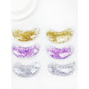 Love and Repeat reusable under-eye gel patch sets in assorted colors and packaging