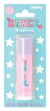 Lip balm packaging with 'Dance the Night Away' text on a blue background with stars.