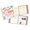 Open vision board journal showing guided prompts and illustrated pages