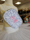 Close-up view of cheetah print belt bag with pink embroidered text