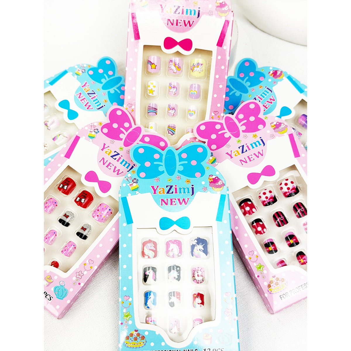 Assorted Love and Repeat kids press-on nail sets in colorful floral, animal, and glitter designs