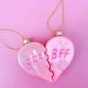 Individual view of pink BFF heart ornaments showing the split-heart design and hanging loops.