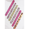 Assorted Love and Repeat leopard-print nail files arranged side by side