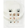 Love and Repeat kids press-on nails with small decorative details displayed on a hand