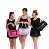 Group of dancers holding matching dance duffle bags over their shoulders