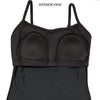 Back view of dancer wearing a black camisole leotard with adjustable straps