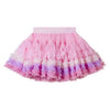 Pink and purple layered ruffle tutu skirt displayed flat