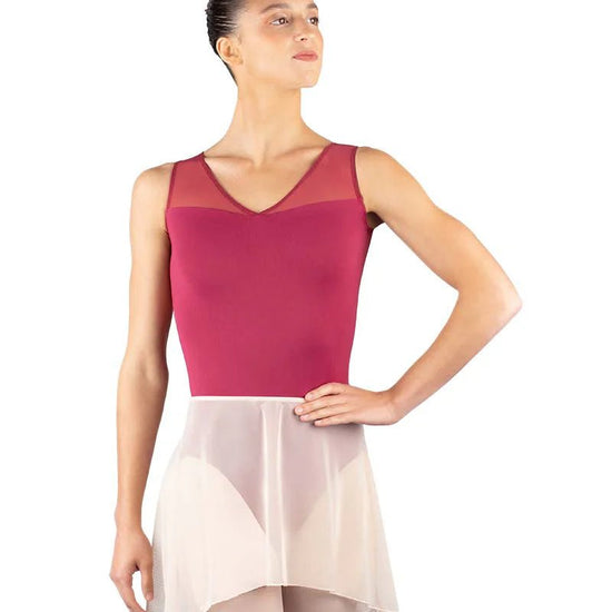 Adult high-low mesh dance skirt worn over leotard, front view on model