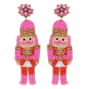 Pink beaded Nutcracker drop earrings with floral stud detail