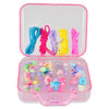 Colorful hair accessories set in a clear container with pink lid