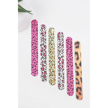 Six Love and Repeat leopard nail files in assorted pink, white, brown, and animal-print designs