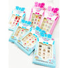 Assorted Love and Repeat kids press-on nail sets in colorful pink, blue, and decorative designs