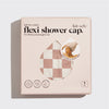 Product packaging for the satin-lined flexi shower cap shown upright