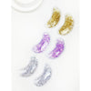 Assorted gold and purple Love and Repeat reusable under-eye gel patches