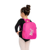Child wearing a hot pink dance backpack for size reference