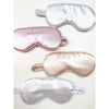 Assorted Love and Repeat satin eye masks displayed side by side