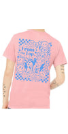 Back view of a light pink graphic t-shirt with a colorful “From the Top” design, shown on a model.
