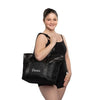Dancer wearing a black dance tote bag over the shoulder