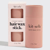 KITSCH hair wax stick shown next to its matching product packaging