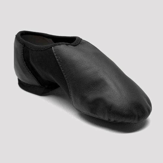 Single black slip-on leather jazz shoe angled slightly to the side on a white background.