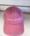 Pink baseball cap with “dance mom” embroidered on the front