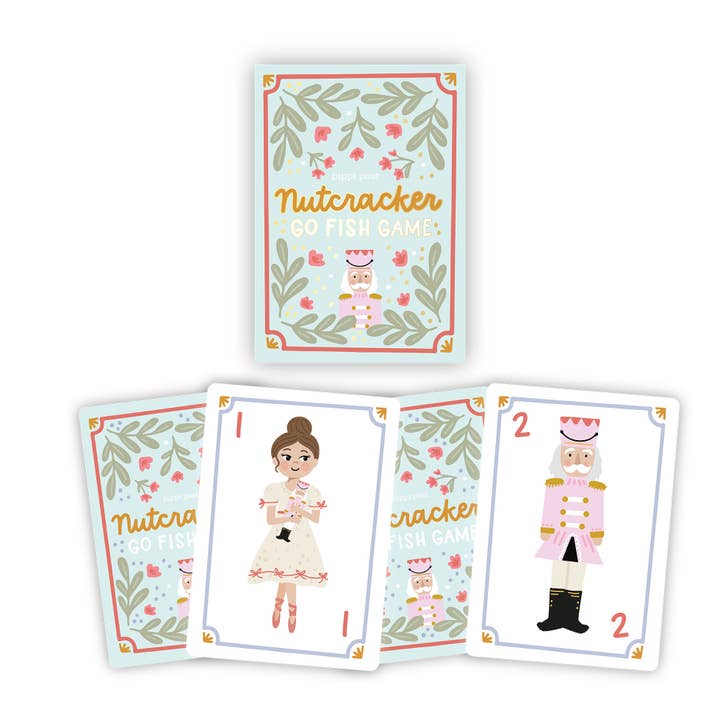 Nutcracker Christmas Go Fish card game box and illustrated character playing cards displayed for holiday gift shoppers