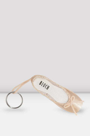 Bloch mini pointe shoe keychain in pink satin with fabric loop and metal key ring on a neutral background.