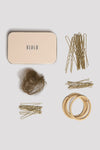 Bloch hair kit contents with storage tin
