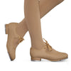Tan full sole adult tap shoe shown on dancer’s foot from side angle
