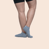 Dancer wearing low-profile performance dance socks on feet, front view