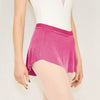 Adult ballet dancer wearing a bright pink pull-on ballet skirt over a leotard