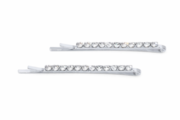 Pair of silver rhinestone single row bobbie pins on a white background