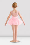Back view of a young dancer wearing a pink tutu leotard with mesh back and attached tutu skirt