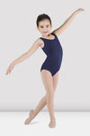 Child dancer wearing navy blue tank leotard posing with arm raised