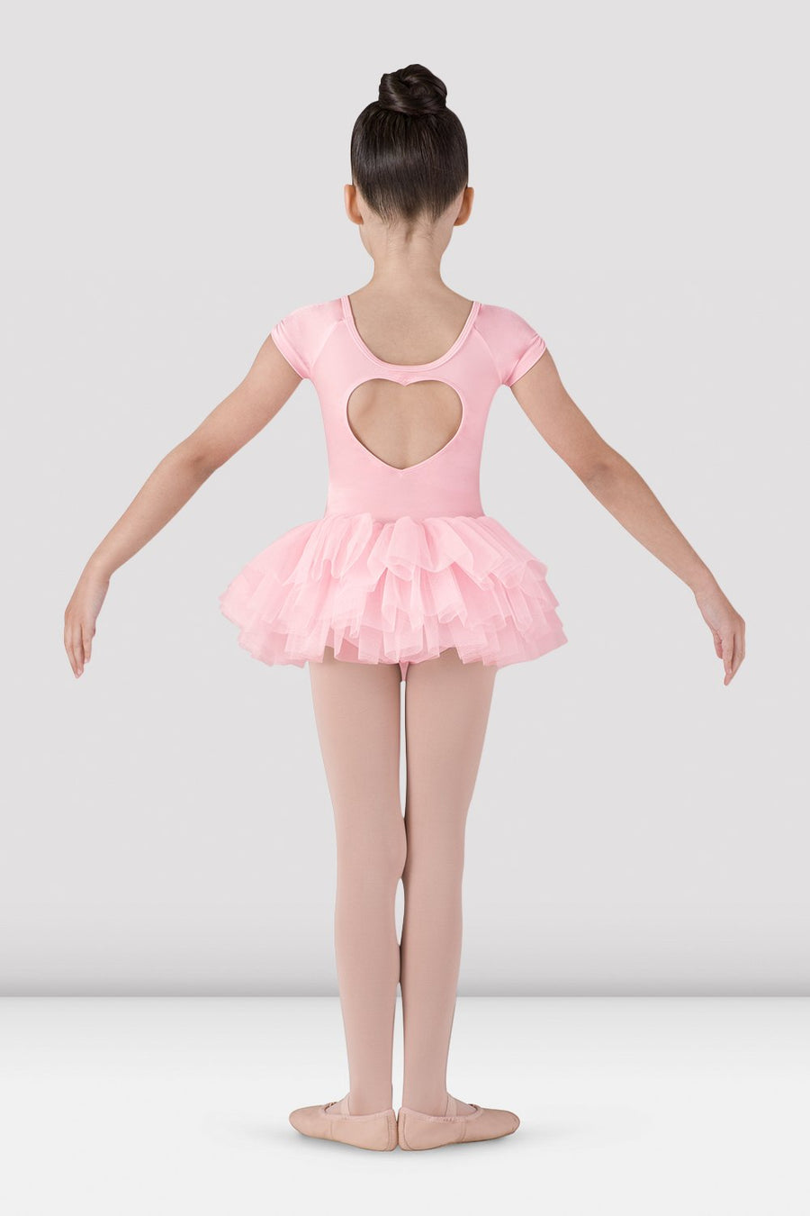 Back view of pink girls tutu leotard dress with heart-shaped cutout and three-layer tulle skirt