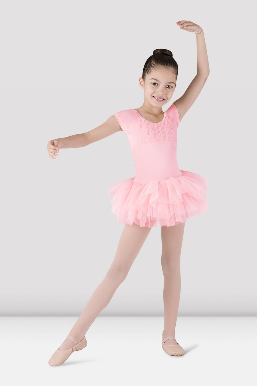 Front view of pink girls tutu leotard dress with cap sleeves and sequin bust detail
