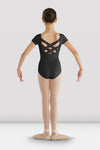 Back view of a girls black leotard with cap sleeves and wide crisscross strap back