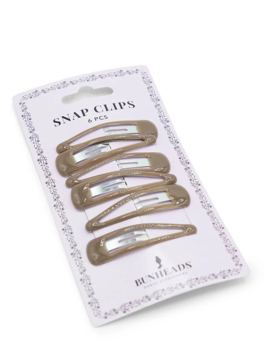Capezio Bunheads snap hair clips in light brown on retail card packaging