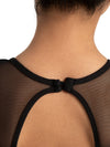 Close-up of mesh puff sleeve and keyhole back detail