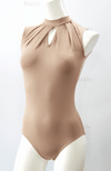 Close-up view of leotard lining detail in neutral color