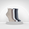 Pair of performance dance socks displayed on mannequin feet in multiple colors