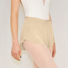 Adult ballet dancer wearing a beige pull-on ballet skirt over a leotard