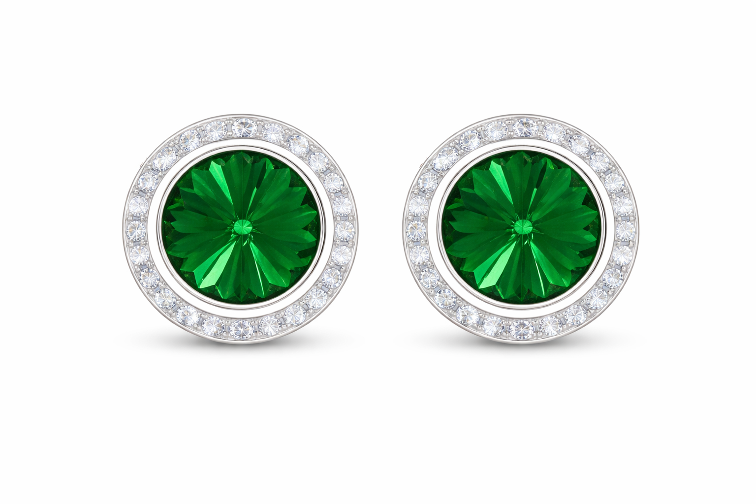 Emerald rondel dance earrings with rivoli center shown as a pair on a white background.